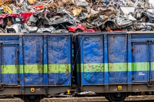 Automotive recycling in rail cars for transport