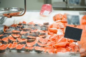 Trout slices on ice table in supermarket